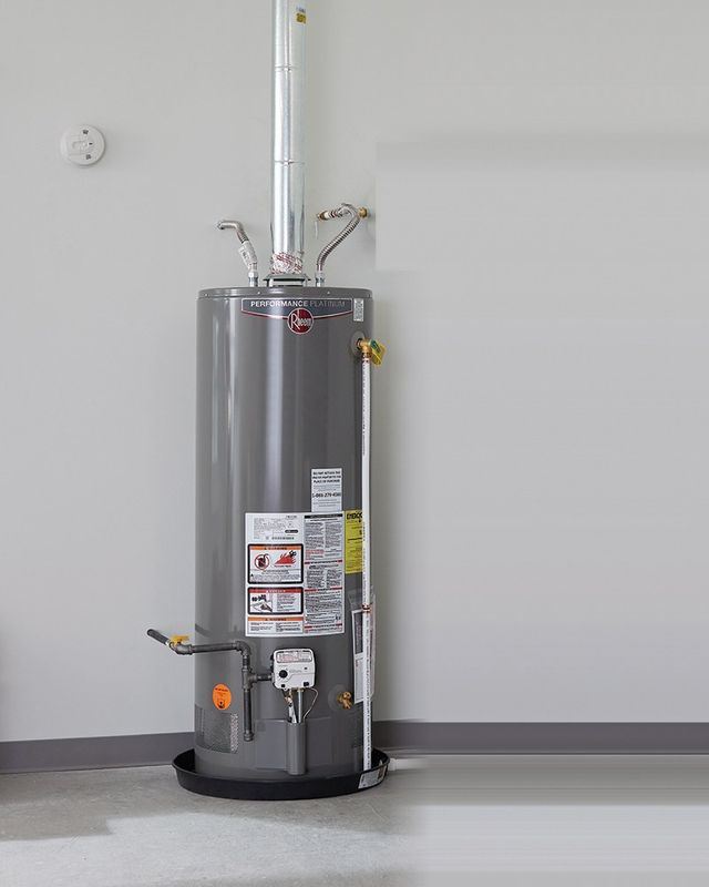 Gas tank water heater installed in a basement utility area